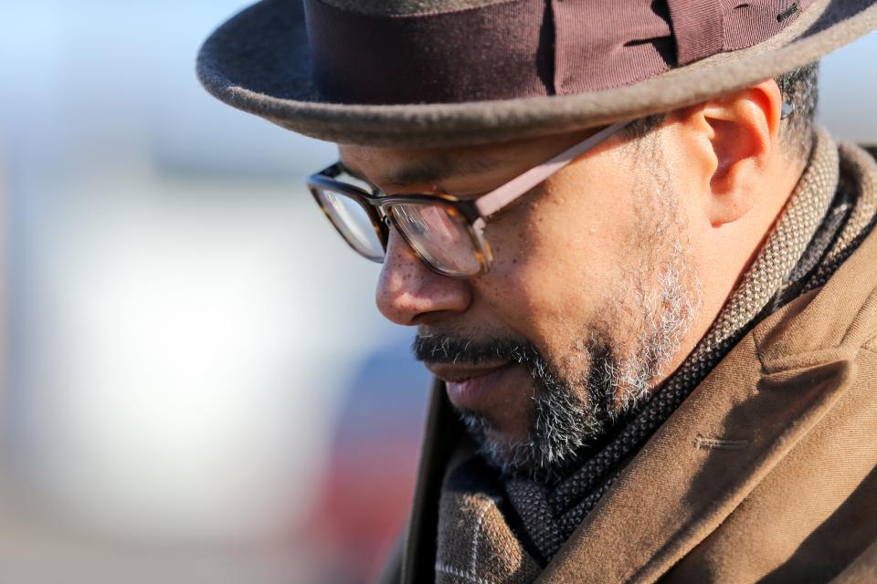 Marcus Clayton waits outside the Muscogee Nation courthouse on Thursday as plaintiffs and supporters attend a preliminary hearing regarding whether the Muscogee Nation is violating the terms of an 1866 treaty by not recognizing descendants of Freedmen as citizens.