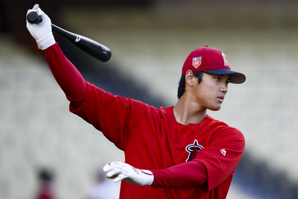 You can put Ohtani in the outfield for a full game in “MLB: The Show 18,” but it takes some work. (AP Photo)