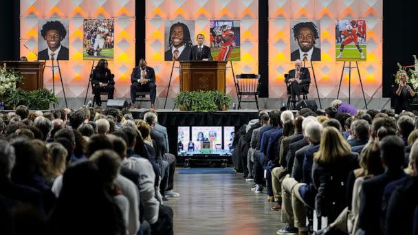 PHOTO: UVA President Jim Ryan speaks during a memorial service for three slain football players Lavel Davis Jr., D'Sean Perry and Devin Chandler at John Paul Jones Arena at the school in Charlottesville, Va., on Nov. 19, 2022. (Steve Helber/AP)