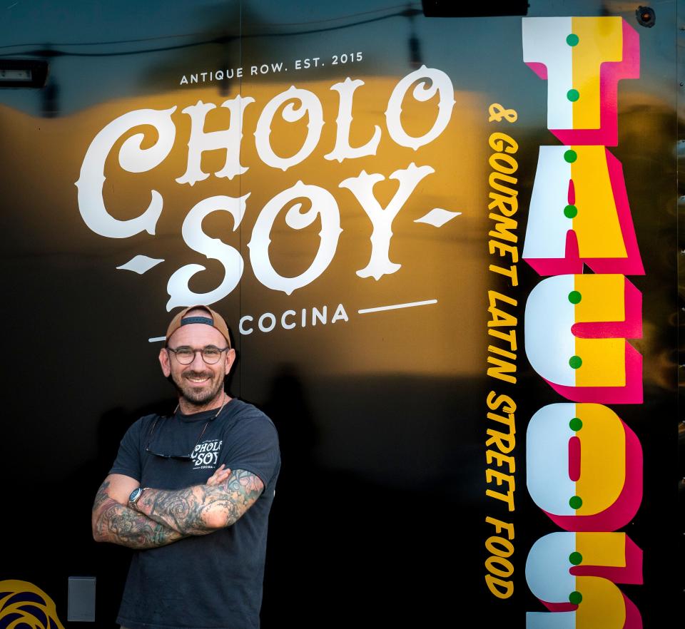 Owner, operator and chef Clay Carnes next to his Cholo Soy Cocina food trailer outside of Civil Society Brewing in West Palm Beach.