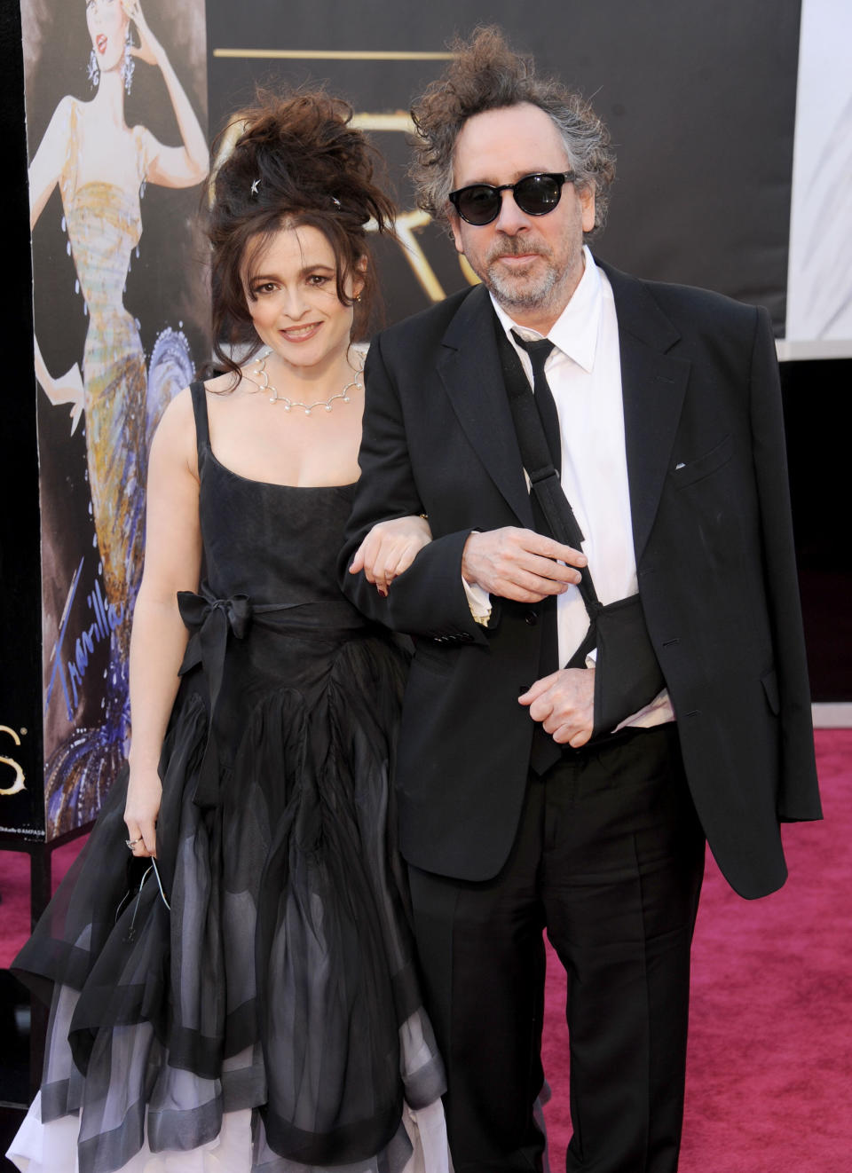 Helena Bonham Carter and director/husband Tim Burton arrive at the Oscars in 2013.&nbsp; (Photo: Gregg DeGuire via Getty Images)