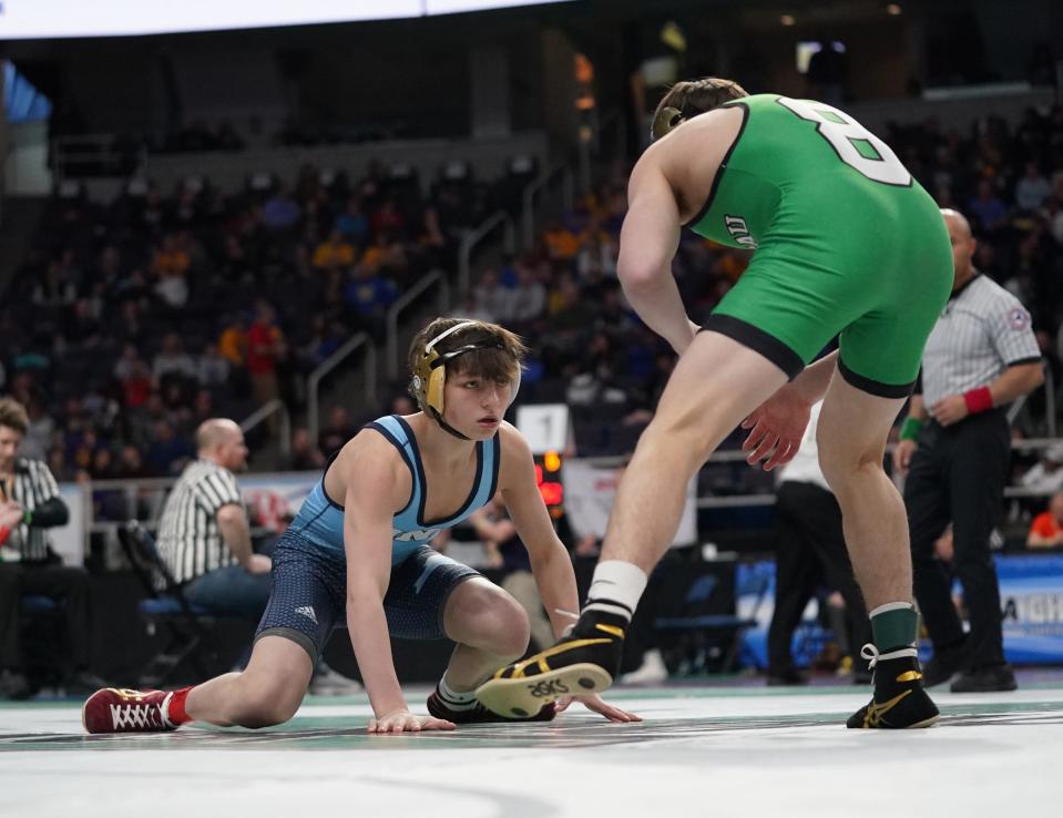 Arlington's Dillon Arrick wrestles in a 118-pound semifinal match at the NYSPHSAA Wrestling Championships at MVP Arena in Albany, on Saturday, February 25, 2023.