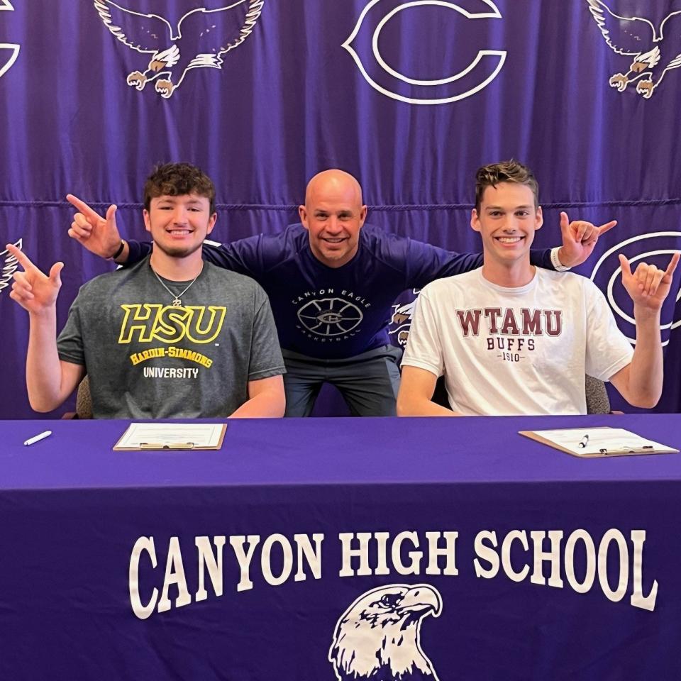 Canyon's Chris Bryant (left), Travis Schulte (center) and Kemper Jones (right) pose for a picture after Bryant and Jones signed their letters of intent to play college basketball. Bryant will play at Hardin-Simmons and Jones will play at West Texas A&M University.