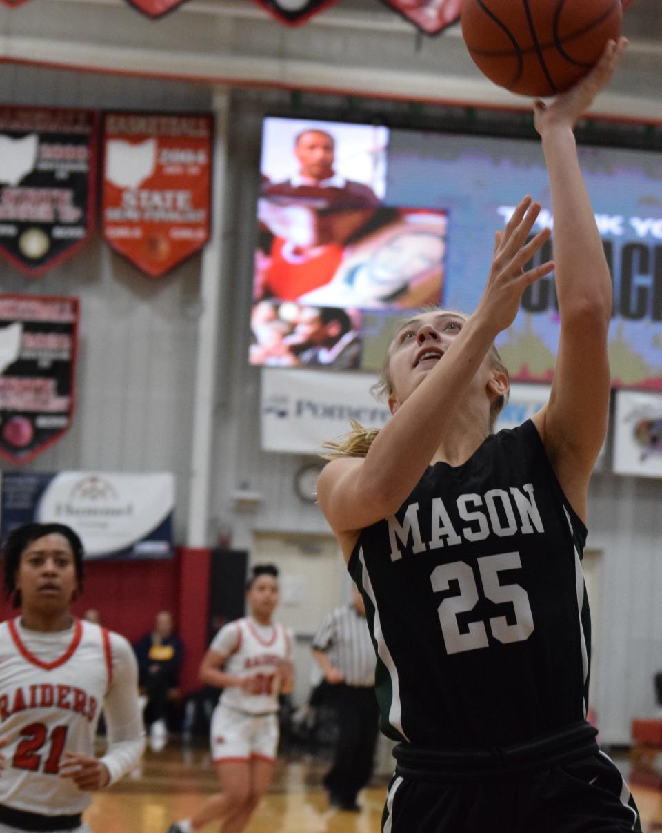 Mason's Becca Sanders goes up for two points during the comets comeback win.