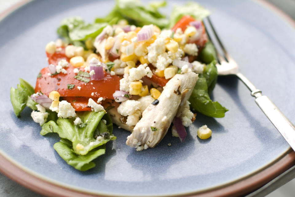 In this image taken on May 20, 2013, grilled Greek chicken salad is shown served on a plate in Concord, N.H. (AP Photo/Matthew Mead)