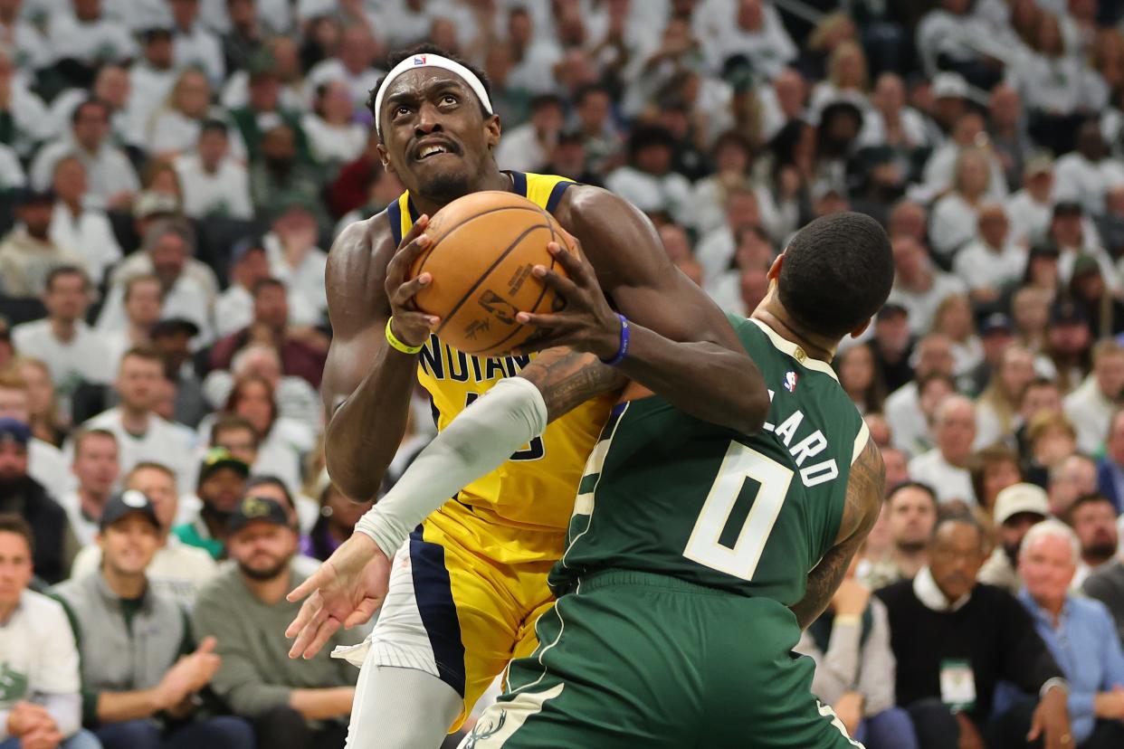 MILWAUKEE, WISCONSIN - APRIL 23: Pascal Siakam #43 of the Indiana Pacers drives around Damian Lillard #0 of the Milwaukee Bucks during the first half of game two of the Eastern Conference First Round Playoffs at Fiserv Forum on April 23, 2024 in Milwaukee, Wisconsin. NOTE TO USER: User expressly acknowledges and agrees that, by downloading and or using this photograph, User is consenting to the terms and conditions of the Getty Images License Agreement. (Photo by Stacy Revere/Getty Images)