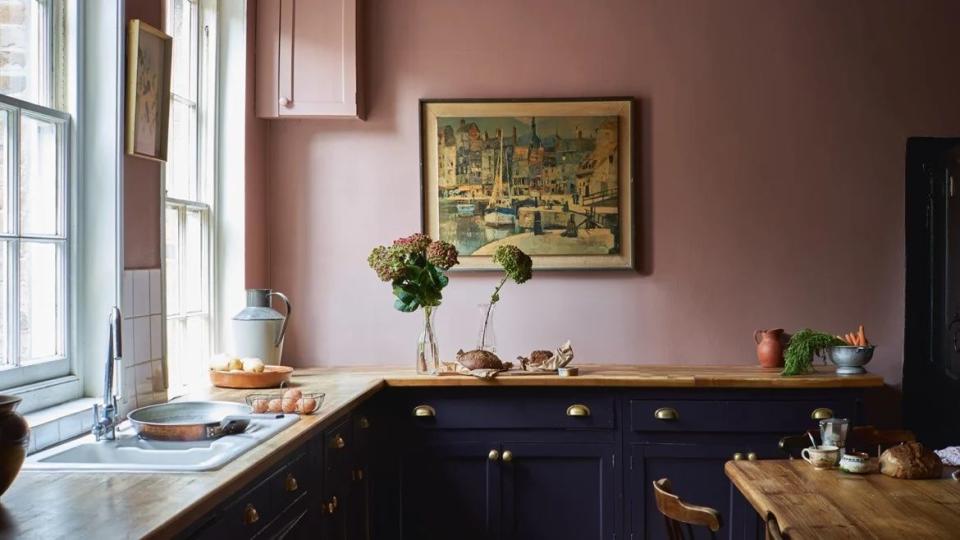 <p>Pink kitchens require a keen eye to avoid an overly saccharine outcome. Rich or chalky shades of pink can be a sophisticated choice, especially when used on shaker cabinets. And as you can see in this fabulous Farrow & Ball kitchen, pink makes a great pairing with deep blues and brass.</p><p>Pictured: <a href="https://www.farrow-ball.com/paint-colours/sulking-room-pink" rel="nofollow noopener" target="_blank" data-ylk="slk:Sulking Room Pink at Farrow & Ball;elm:context_link;itc:0;sec:content-canvas" class="link ">Sulking Room Pink at Farrow & Ball</a></p>