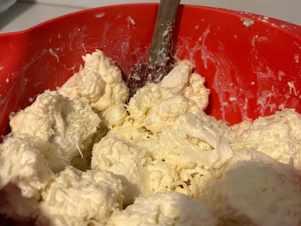 A mixture of cauliflower, heavy cream, cheese, and flour.