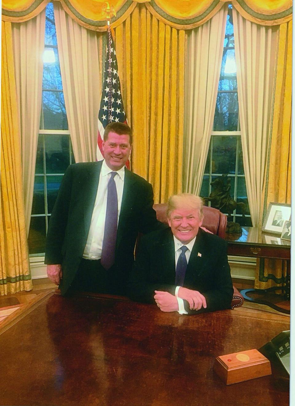 Fred poses with his uncle in the Oval Office and tells Americans who believe the President has been badly treated or portrayed by the media: ‘You don’t know him like I do’ (Courtesy of Fred Trump)