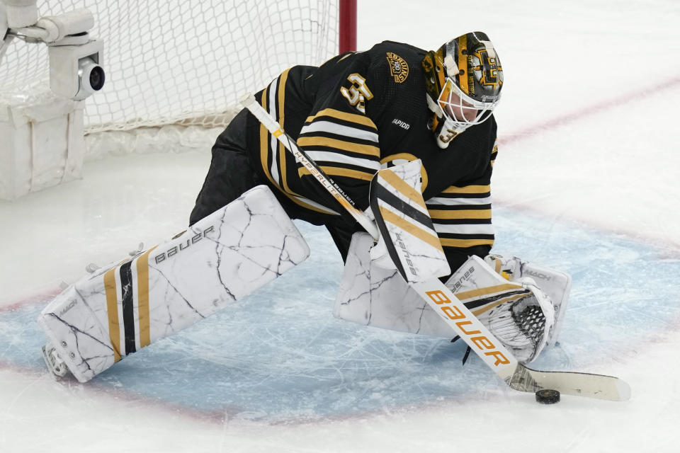 FILE - Boston Bruins goaltender Linus Ullmark (35) makes a save during Game 2 of an NHL hockey Stanley Cup first-round playoff series, April 22, 2024, in Boston. The Bruins traded 2023 Vezina Trophy winning goaltender Ullmark to the Ottawa Senators on Monday, June 24, in exchange for the Senators' 2024 first-round draft pick, forward Mark Kastelic and goaltender Joonas Korpisalo. (AP Photo/Charles Krupa, File)