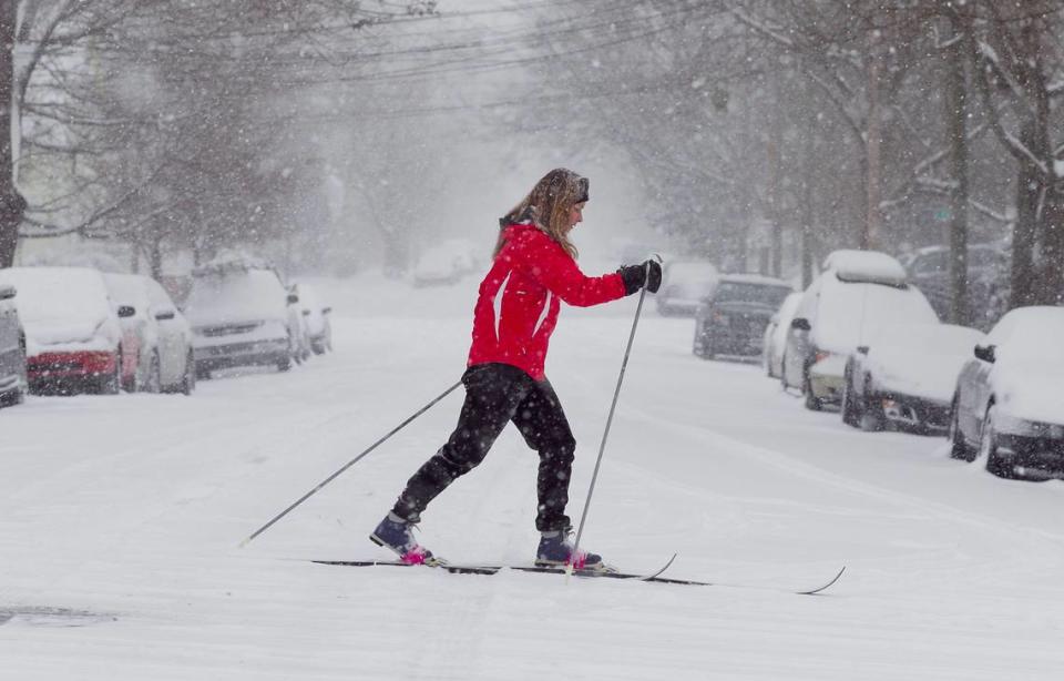 Kara Eckard of Raleigh, N.C. skis down Bloodworth Street during the winter storm on Wednesday February 12, 2014 in Raleigh, N.C.