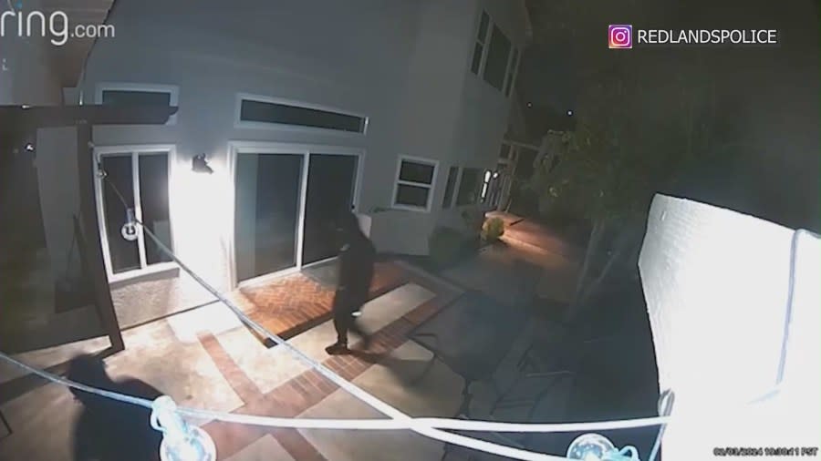 Thieves snooping around the backyard of a Redlands home. (Redlands Police Department)