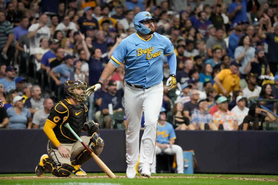 Milwaukee Brewers' Rowdy Tellez hits a three-run home run during the third inning of a baseball game against the San Diego Padres Friday, Aug. 25, 2023, in Milwaukee. (AP Photo/Morry Gash) ORG XMIT: WIMG119