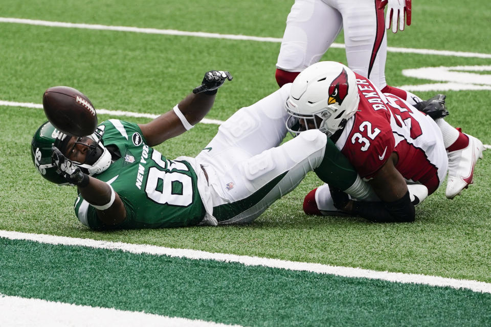 New York Jets cornerback Lamar Jackson (38) loses the ball after diving for a touchdown against Arizona Cardinals strong safety Budda Baker (32) during the second half of an NFL football game, Sunday, Oct. 11, 2020, in East Rutherford. (AP Photo/Seth Wenig)