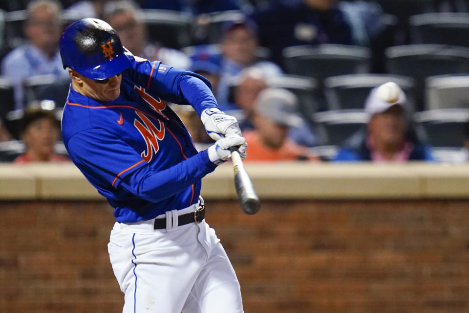 New York Mets' Mark Canha hits a two-run home run during the fifth inning of the team's baseball game against the Milwaukee Brewers on Thursday, June 16, 2022, in New York. (AP Photo/Frank Franklin II)