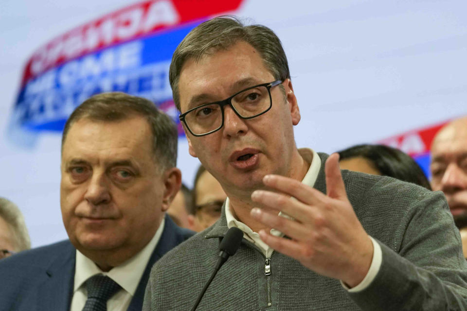 Serbian President Aleksandar Vucic speaks to the media in his party headquarters after a parliamentary and local election in Belgrade, Serbia, Sunday, Dec. 17, 2023. Serbia's governing populists claimed a sweeping victory Sunday in the country's parliamentary election, which was marred by reports of major irregularities both during a tense campaign and on voting day. (AP Photo/Darko Vojinovic)