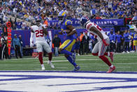 Los Angeles Rams' Robert Woods, center, scores a touchdown during the first half of an NFL football game against the Los Angeles Rams, Sunday, Oct. 17, 2021, in East Rutherford, N.J. (AP Photo/Frank Franklin II)