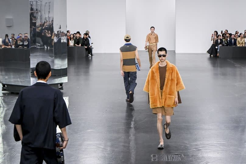 Models wear creations as part of the Fendi Spring Summer 2025 collection, that was presented in Milan