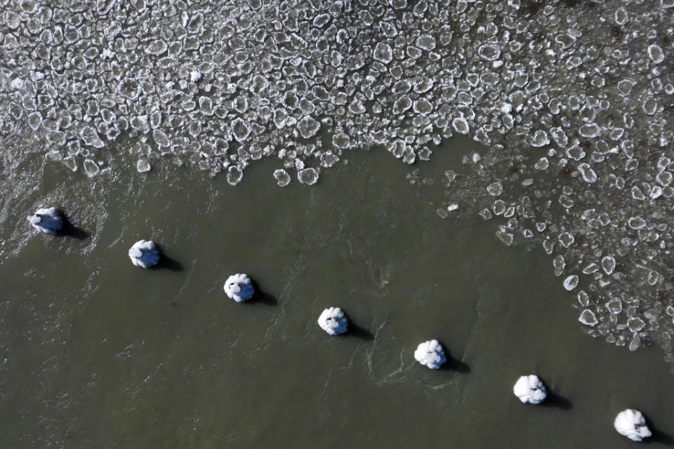 Pancake ice floats on Lake Michigan, Thursday, Feb. 2, 2023, in Chicago. (AP Photo/Erin Hooley)