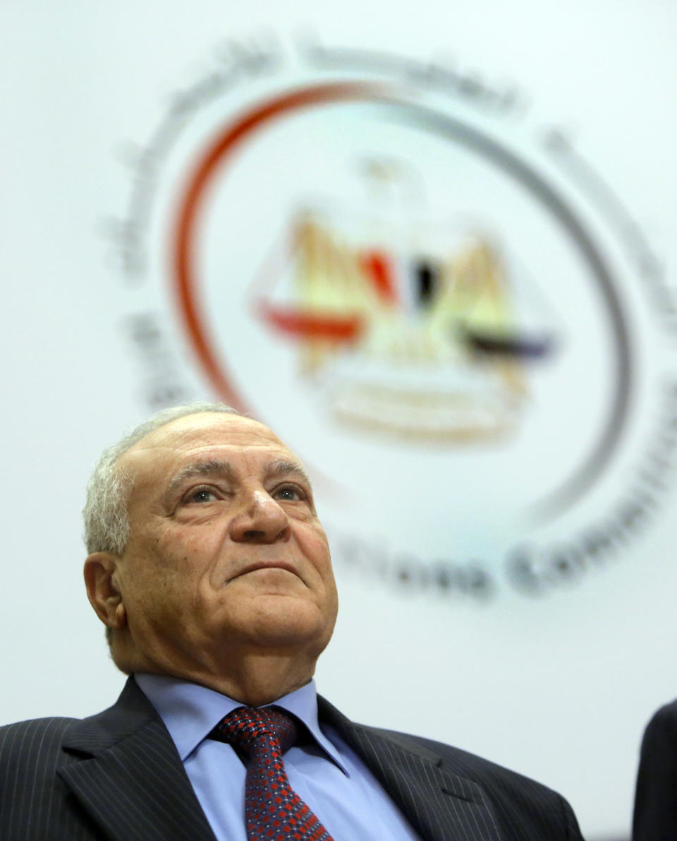 Judge Nabil Salib, head of Egypt's High Election Commission, announces the voting results of a referendum on Egypt's military-backed constitution, saying 98.1 percent supported it in the first vote since a coup toppled the country's president, in Cairo, Egypt, Saturday, Jan. 18, 2014. In the lead up to the vote, police arrested those campaigning for a "no" vote on the referendum, leaving little room for arguing against the document. (AP Photo/Amr Nabil)