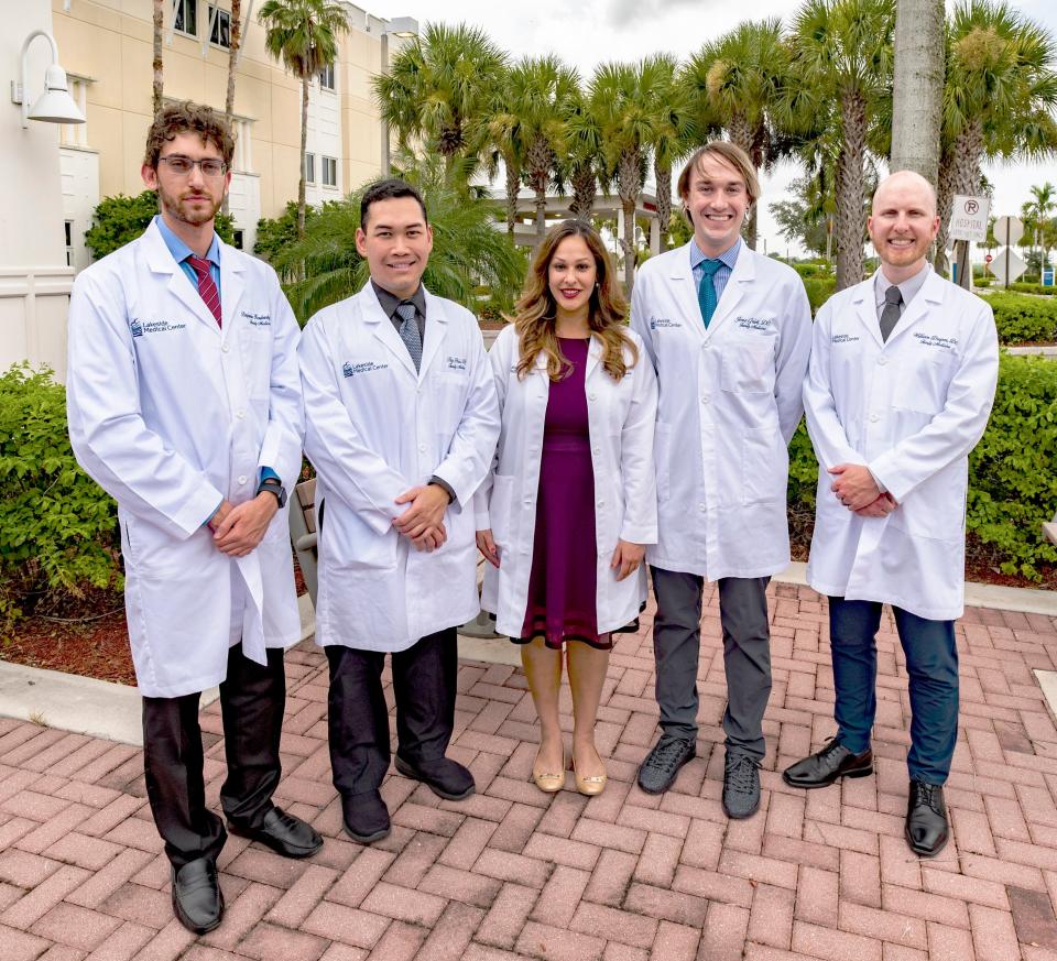 Drs. Benjamin Kosubevsky (left), Thy Hoang Bui, Janaki Saoji Juma, Jesse Carl Grieb and William Carson Draper are Lakeside Medical Center's 10th class of family medicine residents. They completed their work at the Belle Glade site, Palm Beach County's only public hospital, in July 2022.