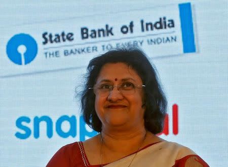 FILE PHOTO: State Bank of India (SBI) Chair Arundhati Bhattacharya smiles during a product launch in Mumbai, India, January 15, 2016. REUTERS/Shailesh Andrade/File Photo