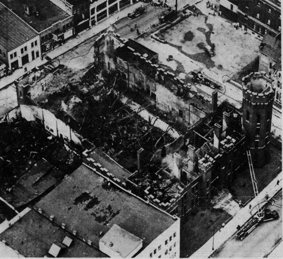 The burned out rubble of the former Binghamton armory still smoldering in 1951.