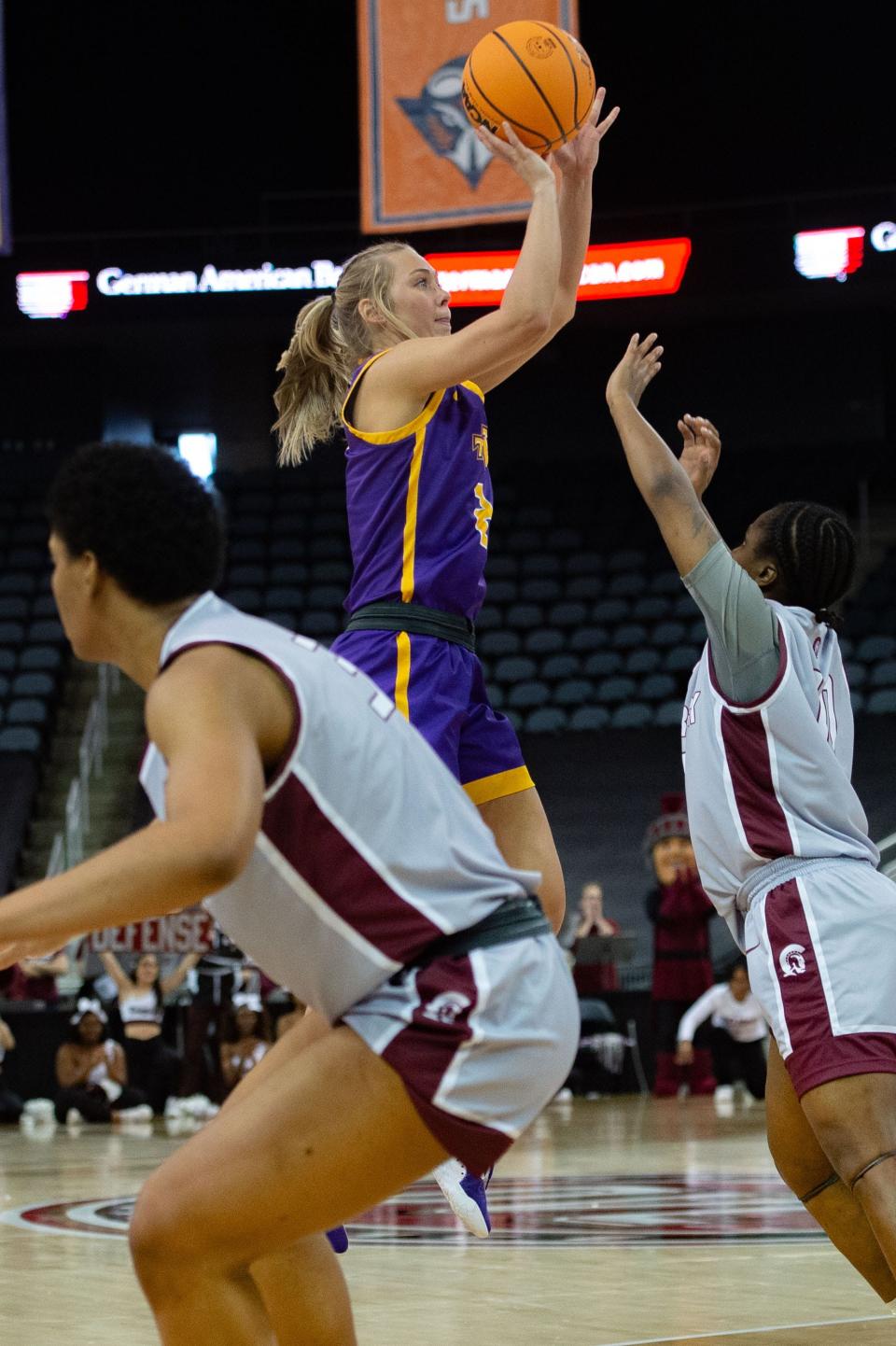 Tennessee Tech’s Jordan Brock (2) leaps for a basket against the Tennessee Tech Golden Eagles during the OVC women's championship at Ford Center on Saturday, March 4, 2023.
