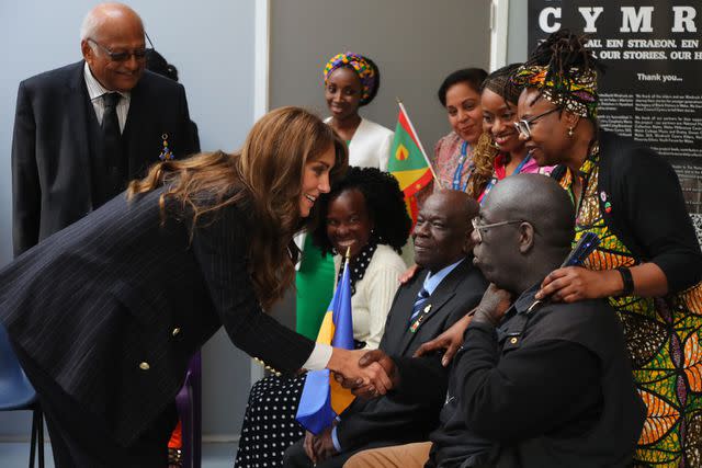 <p>Geoff Caddick - WPA Pool /Getty </p> Kate Middleton meets members of the Windrush Cymru Elders in Wales on Oct. 3