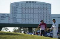 Sergio Garcia of Spain walks around the 17th green with his caddie Glenn Murreay in third round play during the 2017 Masters golf tournament at Augusta National Golf Club in Augusta, Georgia, U.S., April 8, 2017. REUTERS/Jonathan Ernst