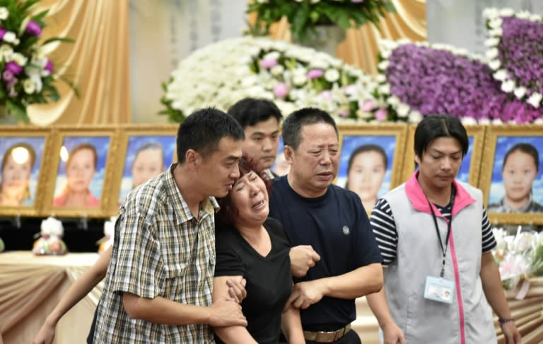 The first group of 46 relatives arrived in Taiwan to identify the bodies of their loved ones killed in a bus inferno