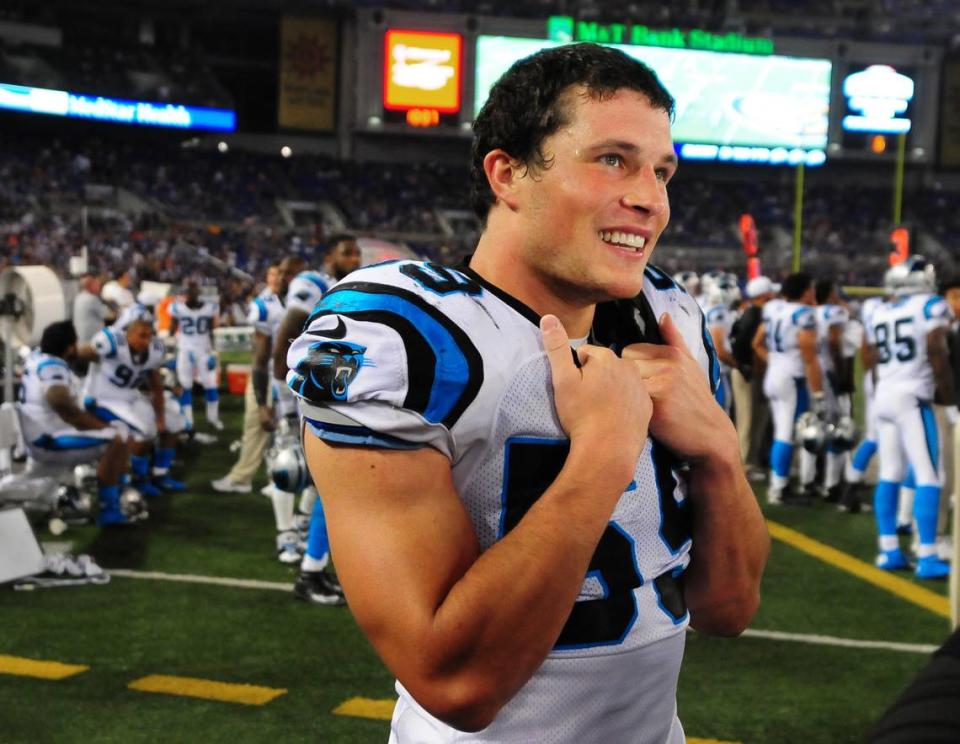 Carolina Panthers (59) linebacker Luke Kuechly smiles as he is interviewed by ESPN during the fourth quarter of a preseason game at Baltimore in 2013. 