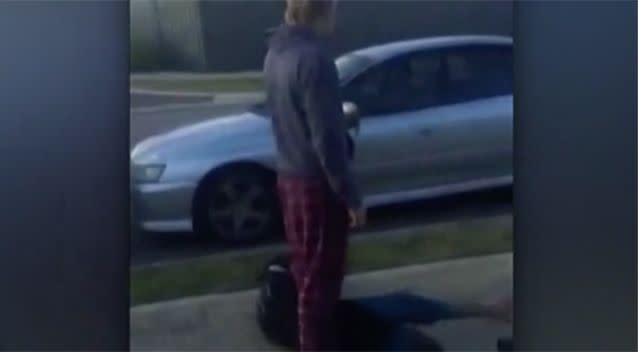 Burton casually stood in his pyjamas over the man and smoked a cigarette while he waited for police to arrive. Photo: Channel 7