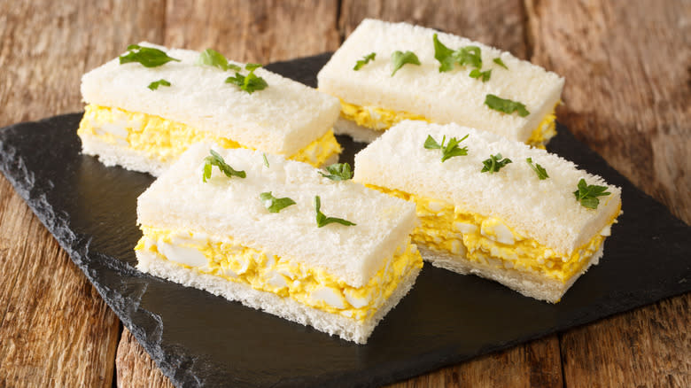 Egg salad sandwiches on stone