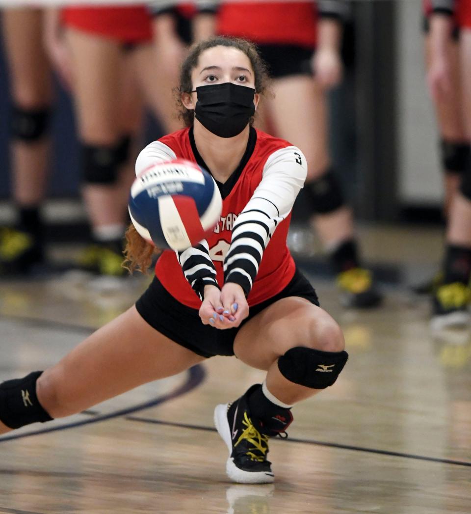 Neely Alger of Barnstable digs out a Franklin serve in the MIAA Division 1 round of 8 volleyball match last November in Franklin.