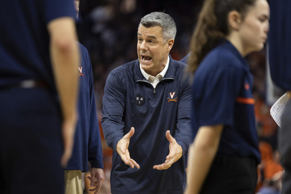 Virginia head coach Tony Bennett gestures during the first half of an NCAA college basketball game against Florida State in Charlottesville, Va., Saturday, Dec. 3, 2022. (AP Photo/Mike Kropf)