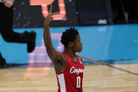 Houston guard Marcus Sasser (0) celebrates a 3-point basket during the first half of a men's Final Four NCAA college basketball tournament semifinal game against Baylor, Saturday, April 3, 2021, at Lucas Oil Stadium in Indianapolis. (AP Photo/Michael Conroy)
