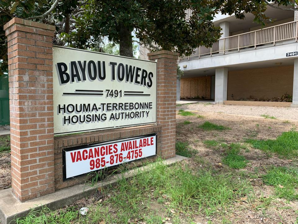 Windows remain boarded up at the 300-unit Bayou Towers public housing complex along West Park Avenue in Houma on Monday, July 18, 2022.