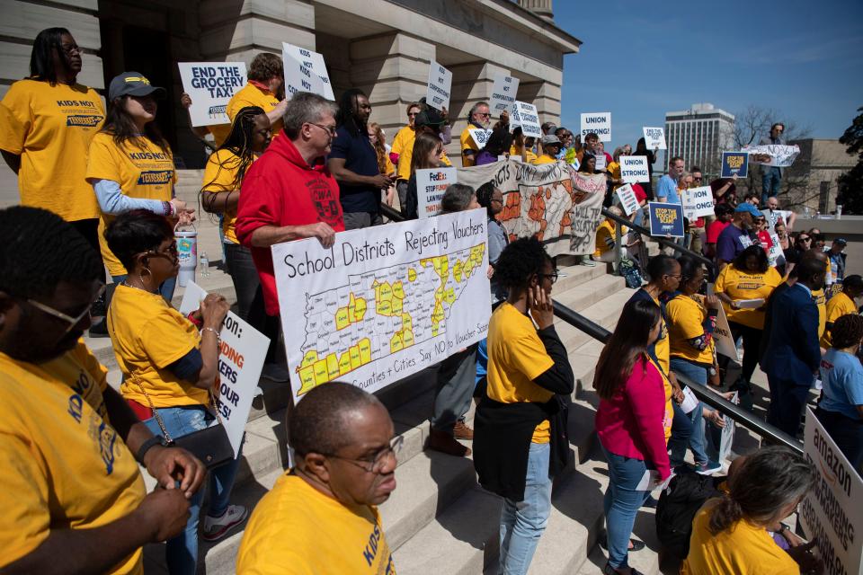 People gather to protest a school voucher bill, among other measures, at the Tennessee Capitol in Nashville on March 12.