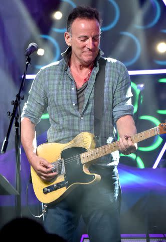 <p>Kevin Mazur/Getty Images </p> Bruce Springsteen performs onstage during the grand re-opening of the Asbury Lanes on June 18, 2018, in Asbury Park, NJ.