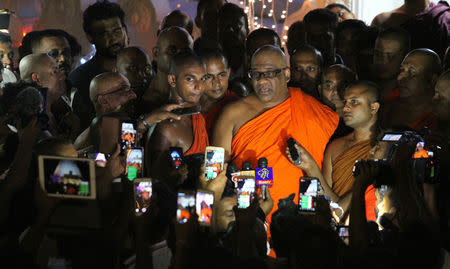 Buddhist monk Galagoda Aththe Gnanasara, head of the hardline Bodu Bala Sena (BBS) or "Buddhist Power Force", speaks to media at a temple after leaving the prison with Sri Lanka's president Maithripala Sirisena's pardon in Colombo, Sri Lanka May 23, 2019. REUTERS/Stringer