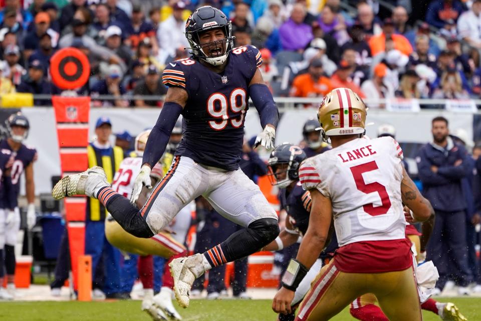 Chicago Bears' Trevis Gipson reacts after deflecting a pass of San Francisco 49ers' Trey Lance during the first half of an NFL football game Sunday, Sept. 11, 2022, in Chicago. (AP Photo/Charles Rex Arbogast)