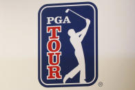 FILE - The PGA Tour logo is shown during a press conference in Tokyo, Tuesday, Nov. 20, 2018. Tiger Woods and Rory McIlroy have illustrated with words what PGA Tour Commissioner Jay Monahan got wrong. McIlroy said players leaving for Saudi-funded LIV Golf are taking the easy way out. Woods says they are turning their backs on the tour that made them. (AP Photo/Koji Sasahara, File)