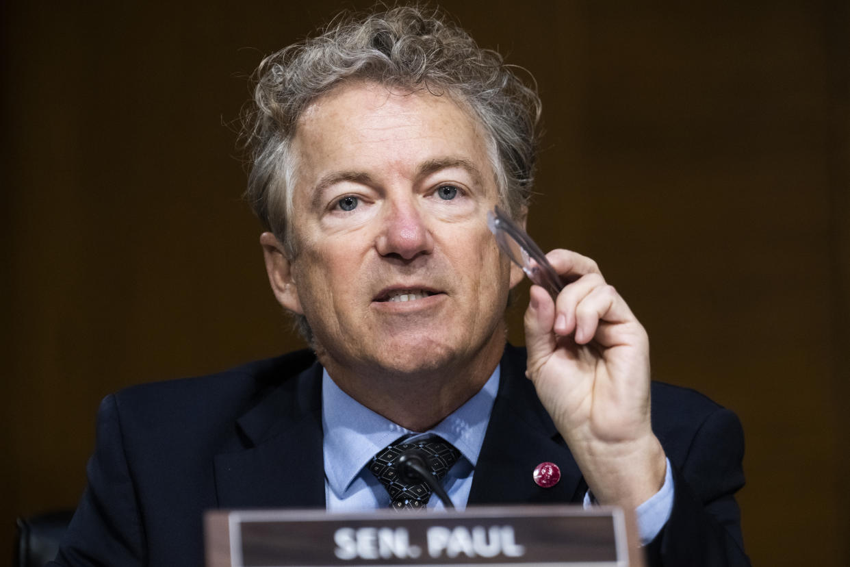 Senator Rand Paul sits at a Senate committee hearing. 