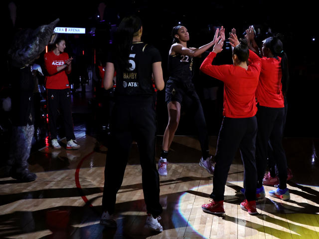 Las Vegas Aces forward A'ja Wilson is greeted by teammates during player introductions before a game on May 8, 2022 in Las Vegas. (Ethan Miller/Getty Images)