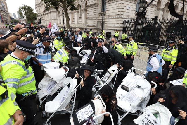 Demonstrators on Whitehall (James Manning/PA) 