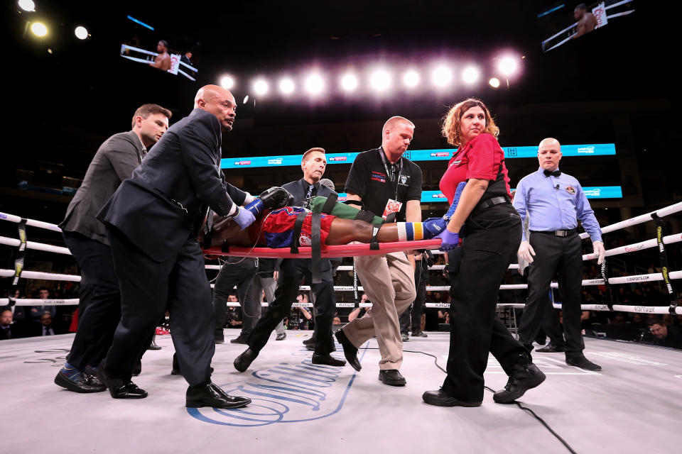 CHICAGO, ILLINOIS - OCTOBER 12:  Patrick Day is taken out of the ring on a stretcher after being knocked out by Charles Conwell in the 10th round of their Super-Welterweight bout at Wintrust Arena on October 12, 2019 in Chicago, Illinois. (Photo by Dylan Buell/Getty Images)