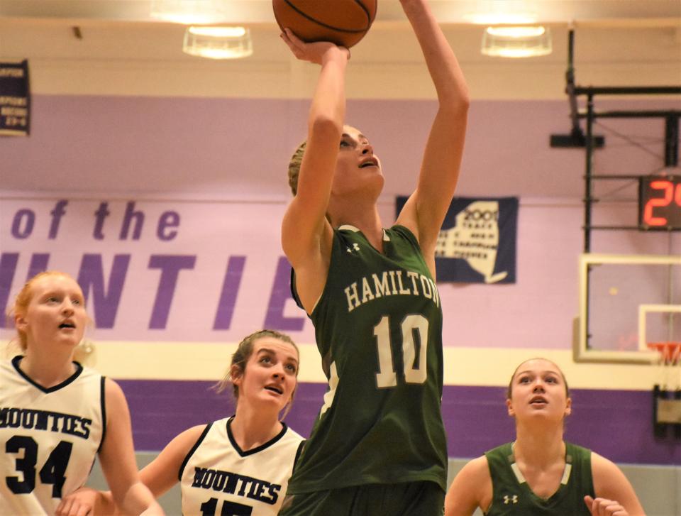 Lindsey Speer puts up a shot for Hamilton during the first half of Wednesday's game at Little Falls. Speer is back after missing the second half of last season and the Eemerald Knights' run to the sectional finals.