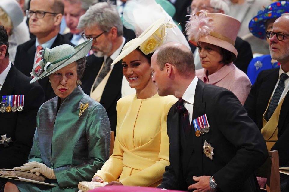 From left, Britain's Princess Anne, Kate, Duchess of Cambridge and Prince William attend the National Service of Thanksgiving held at St Paul's Cathedral as part of celebrations marking the Platinum Jubilee of Britain's Queen Elizabeth II, in London, Friday, June 3, 2022. (Aaron Chown/Pool photo via AP)