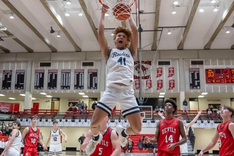 Harrison junior Malachi King (41) thunders home a dunk late in the IU Health Hoops Classic basketball championship game, West Lafayette vs Harrison, Saturday, Dec. 2, 2023, at Crawley Center in Lafayette, Ind. Harrison won 84-61.